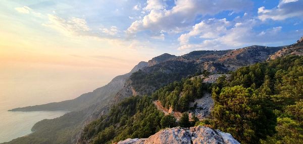 Scenic view of mountains against sky during sunset