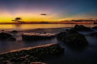 Scenic view of sea against sky during sunset