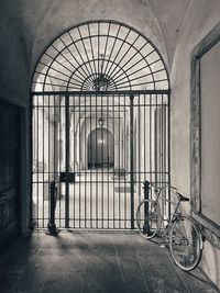 Rear view of man walking in tunnel