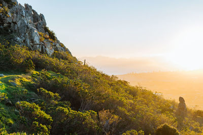 Scenic view of mountains against sky during sunset