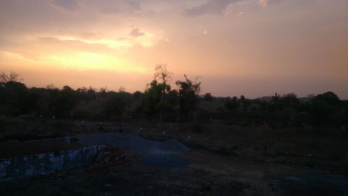 Scenic view of landscape against sky during sunset