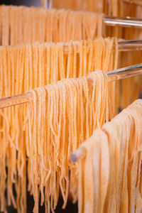 Full frame shot of clothes hanging at market stall