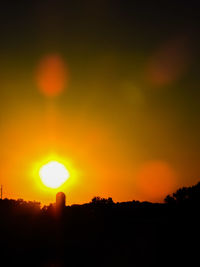 Scenic view of landscape at sunset