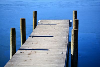 High angle view of wooden pier over lake