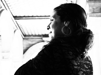 Portrait of young woman looking away