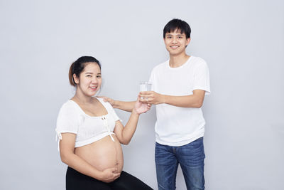 Portrait of a smiling young couple