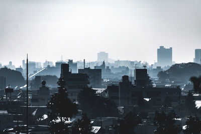 Cityscape against clear sky