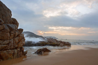 Scenic view of beach against sky