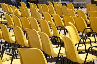 Empty chairs and table in room