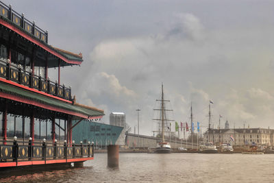 Harbor by sea against sky