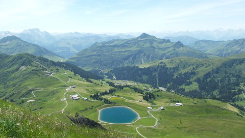 High angle view of golf course against sky