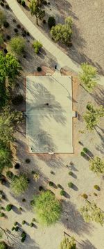 High angle blew of basketball court by trees