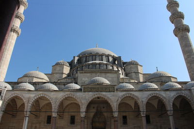 Low angle view of mosque against sky