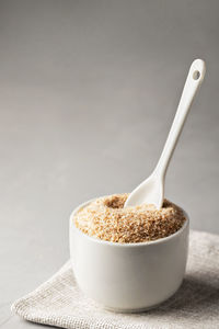 Close-up of breakfast on table against white background