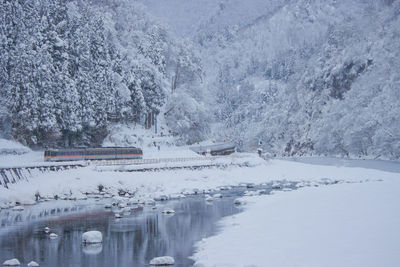 Train through a snowy valley