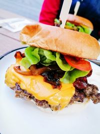 Close-up of fresh bread in plate on table