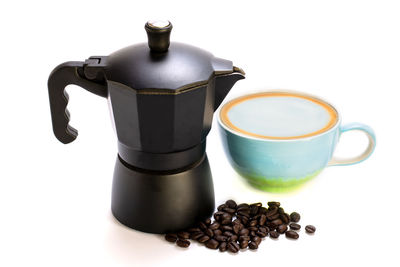 Close-up of coffee cup against white background