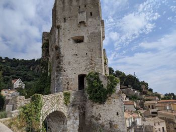 Low angle view of old building against sky