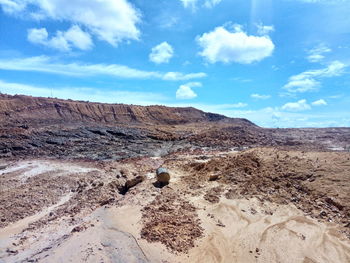 Scenic view of desert against sky