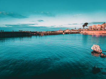 Scenic view of sea against blue sky