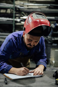 Man working with umbrella