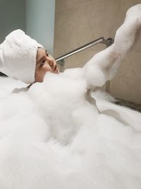 Close-up of young woman in water