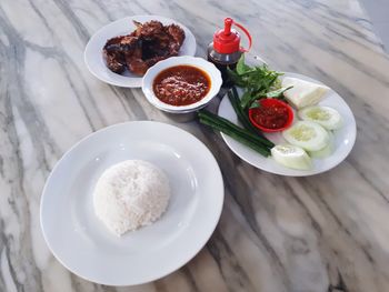 High angle view of food served on table