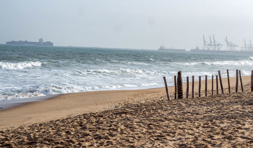 Scenic view of beach against sky