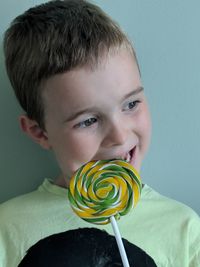Close-up portrait of boy holding ice cream