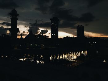 Silhouette of city at night