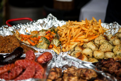 Close-up of various seafood served in container