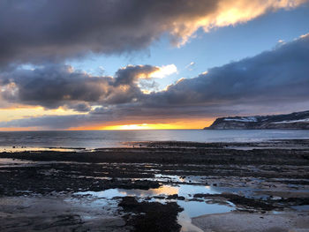 Scenic view of sea against sky during sunset