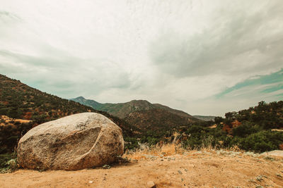 Rocks on land against sky