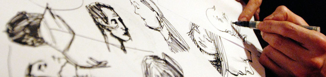 Close-up of human hand on paper