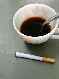 High angle view of coffee cup on table