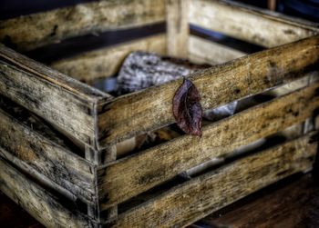 High angle view of rusty metal on wood