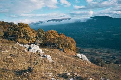 Scenic view of rocky mountains against sky