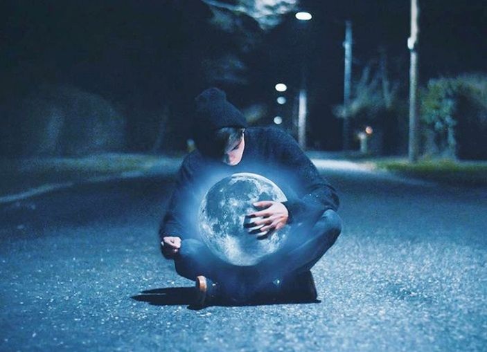 one person, night, men, mystery, full length, adult, fortune telling, fantasy, nature, illuminated, spooky, city, casual clothing, crystal ball, street, outdoors, focus on foreground, contemplation