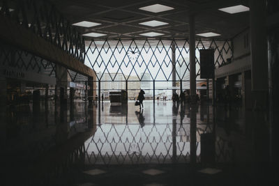 People waiting at airport building