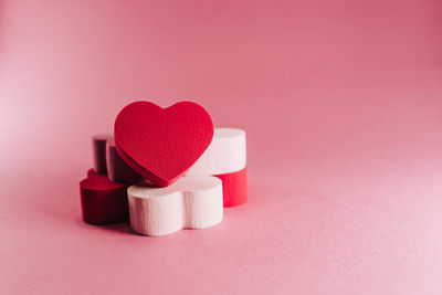 Close-up of heart shape on pink box