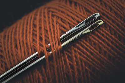 Close-up of sewing needle and thread