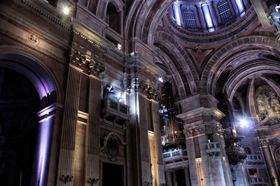 Low angle view of illuminated cathedral at night