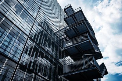 Low angle view of modern buildings against sky