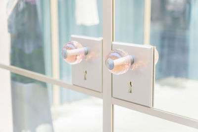 Close-up of round glass door handle. selective focus