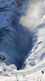 Scenic view of snow covered mountains