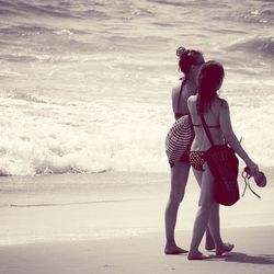 Woman walking on beach