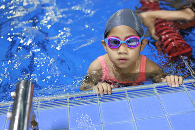 Portrait of girl in swimming pool