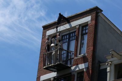 Low angle view of the three graces on amsterdam balcony. 