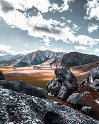 Scenic view of snowcapped mountains against sky