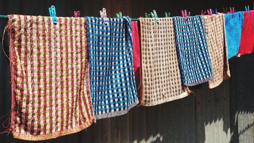 Close-up of clothes drying for sale at market